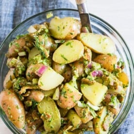 This herbed Dijon mustard potato salad is the perfect summertime salad. It’s packed full of flavor and lots of crispy bacon. Plus it’s mayonnaise free so it’s perfect for outdoor picnics and parties!