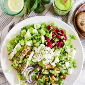 This Greek yogurt green goddess dressing is the perfect summertime dressing. Perfectly creamy and made with zero mayonnaise or sour cream. Say goodbye to store bought dressing - you'll love how easy this dressing is to make!