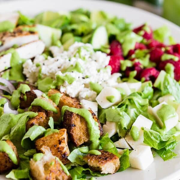 This Greek yogurt green goddess dressing is the perfect summertime dressing. Perfectly creamy and made with zero mayonnaise or sour cream. Say goodbye to store bought dressing - you'll love how easy this dressing is to make!