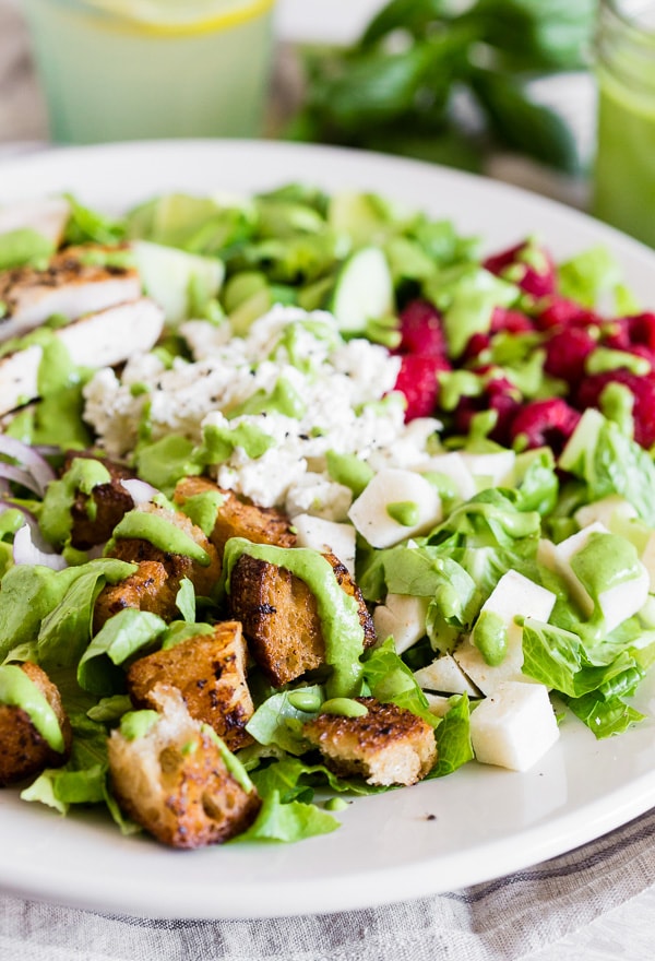 Greek Yogurt Green Goddess Dressing on top of a green salad.