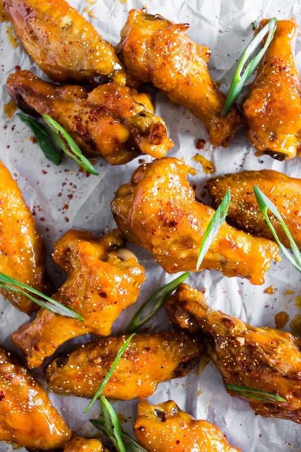 These pineapple mango habanero chicken wings are the perfect summertime appetizer or easy dinner! They're a delicious mix of sweet and spicy and can be made in your oven or the grill. It's time to give into your chicken wing cravings!