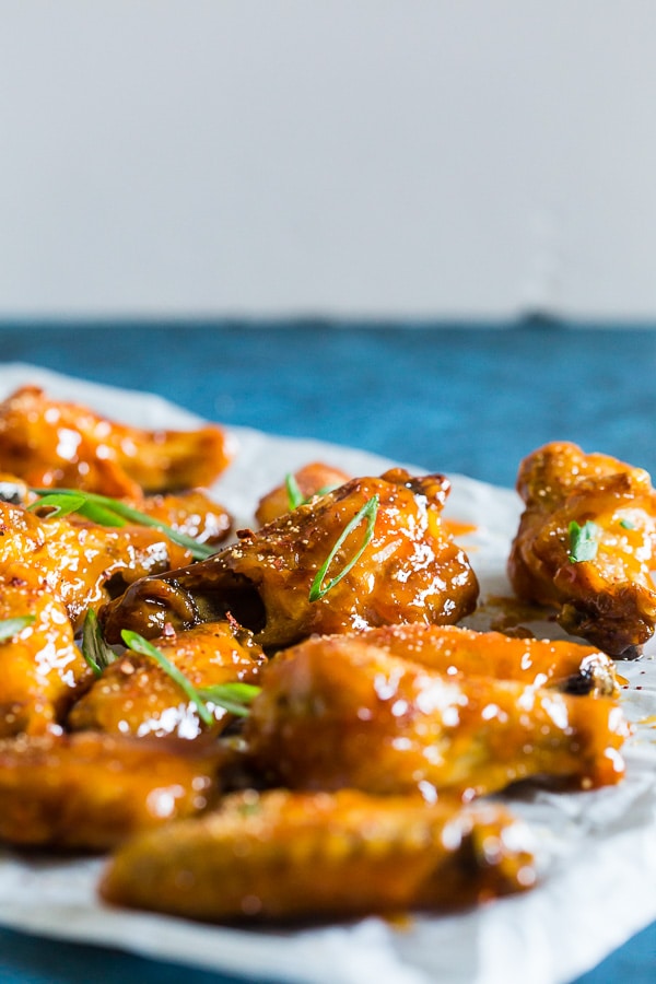 These pineapple mango habanero chicken wings are the perfect summertime appetizer or easy dinner! They're a delicious mix of sweet and spicy and can be made in your oven or the grill. It's time to give into your chicken wing cravings!