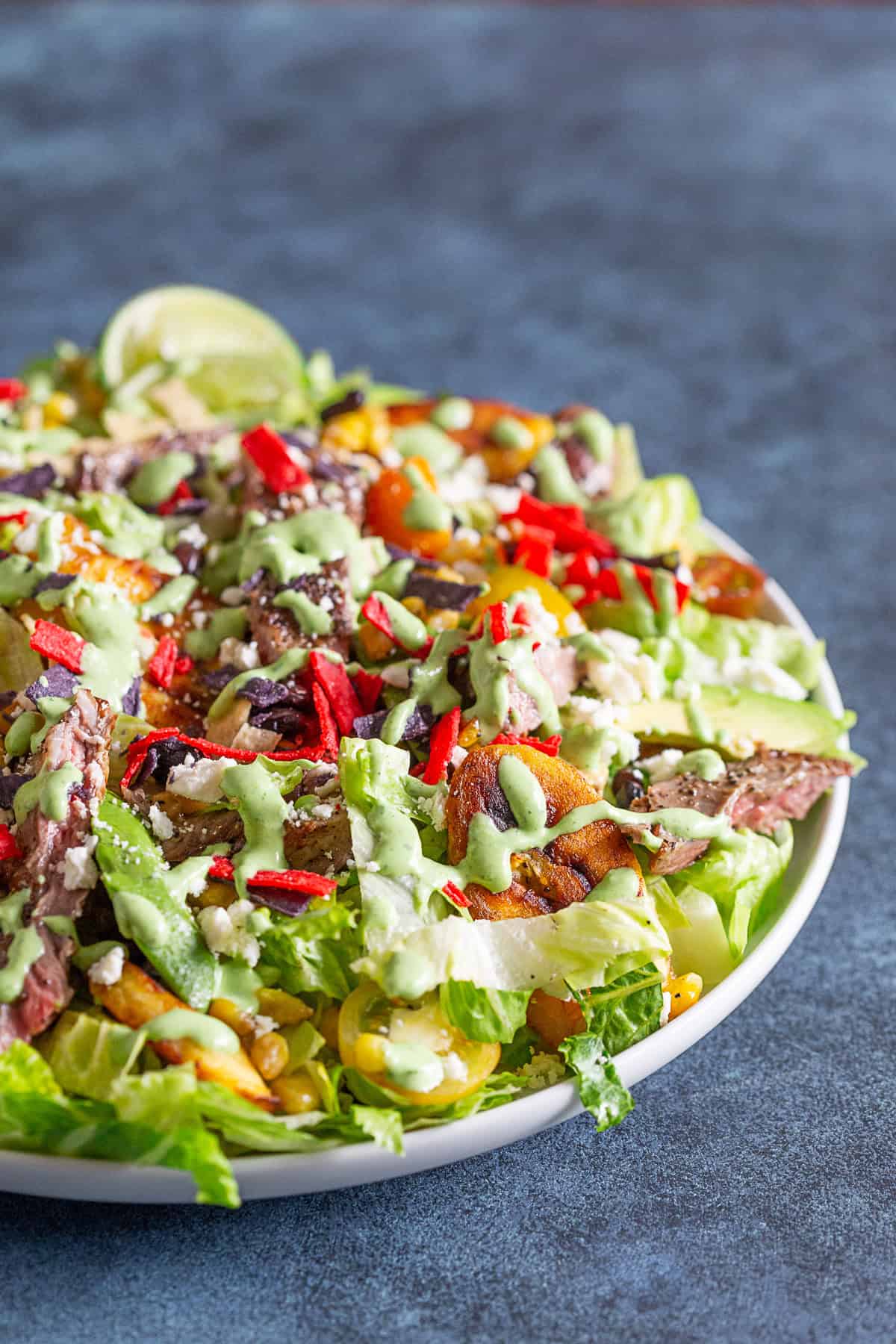 Southwest Steak Salad drizzled with cilantro dressing.