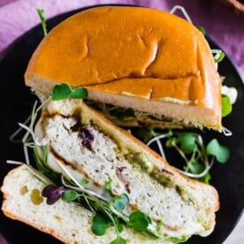 These cranberry pesto chicken burgers are packed full of flavor and the perfect balance of sweet and savory. You'll love how easy these burgers are to make and they pair perfectly with all your summer bbq favorite side dishes. Plus they're ready in just 30 minutes!