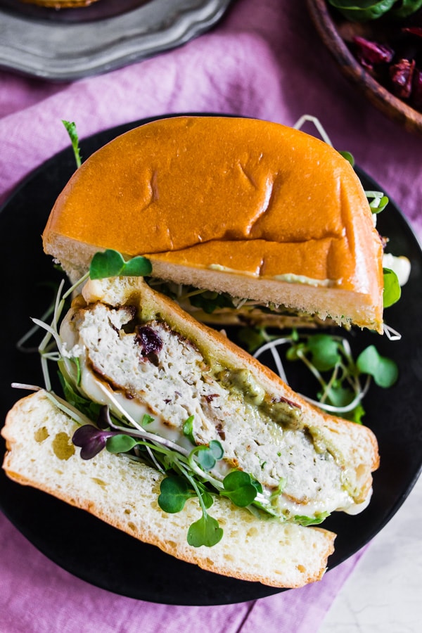These cranberry pesto chicken burgers are packed full of flavor and the perfect balance of sweet and savory. You'll love how easy these burgers are to make and they pair perfectly with all your summer bbq favorite side dishes. Plus they're ready in just 30 minutes!