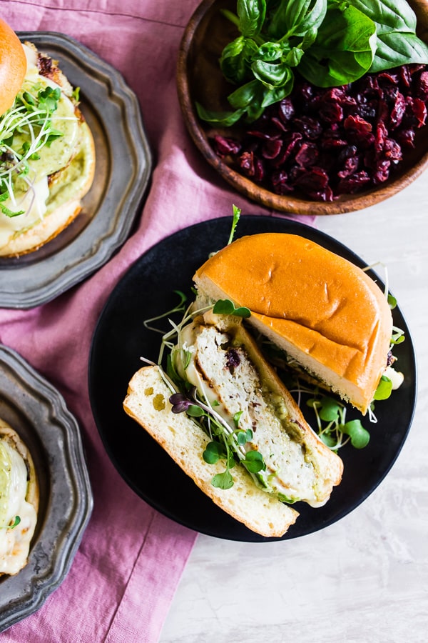 These cranberry pesto chicken burgers are packed full of flavor and the perfect balance of sweet and savory. You'll love how easy these burgers are to make and they pair perfectly with all your summer bbq favorite side dishes. Plus they're ready in just 30 minutes!