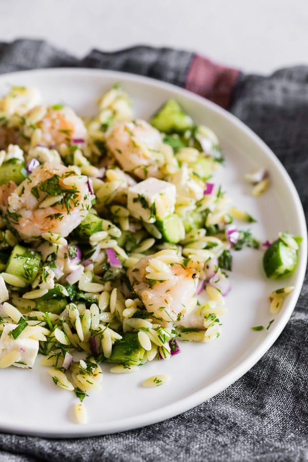 Herbed Shrimp Orzo Salad on a small white plate.