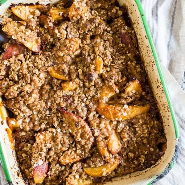 ginger peach crisp in a small metal dish