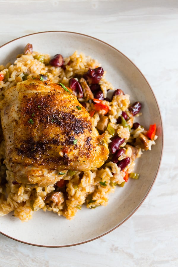 One Pot Cajun Chicken and Rice spooned onto a plate. 