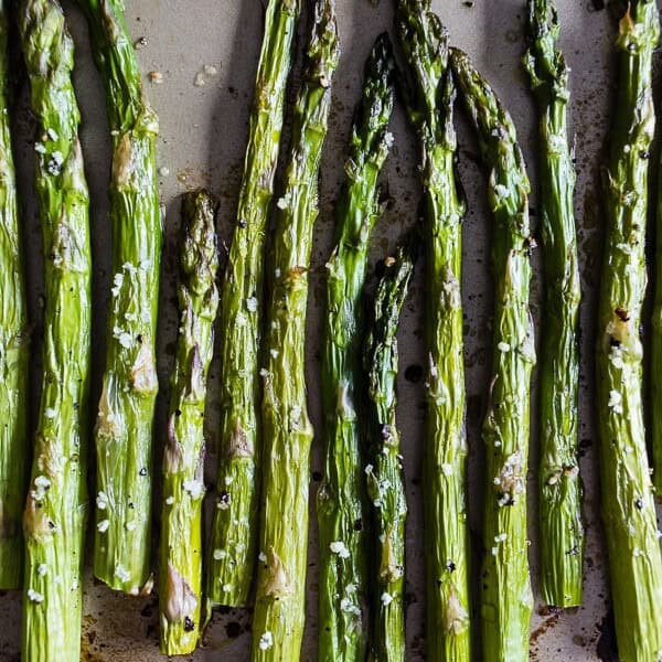 This roasted asparagus is perfectly seasoned and the perfect side dish. Made with just 4 ingredients and ready in just 15 minutes. You'll love how easy it is to go from boring asparagus to CRAZY GOOD asparagus.