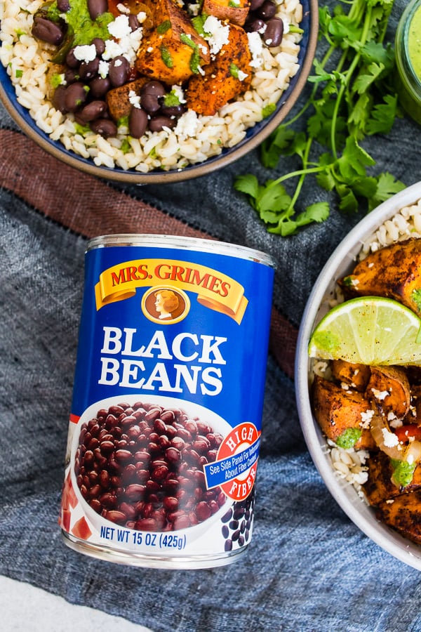 Sweet Potato Black Bean Burrito Bowls n a bowl with a can of black beans.