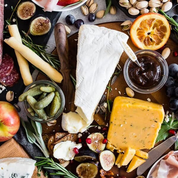 This fall harvest cheese board is the perfect combo of flavorful cheeses, Italian meats, dried fruits, fresh fruits and crispy crunchy crackers. If you have ever been intimidated about putting together a cheese board I have you covered with step by step instructions!