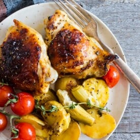 This sheet pan French dressing chicken thigh dinner is the perfect combination of Zesty French dressing tossed with baby potatoes, artichoke hearts and vine-ripened tomatoes. You’ll love how easy it to throw together and how delicious it tastes!