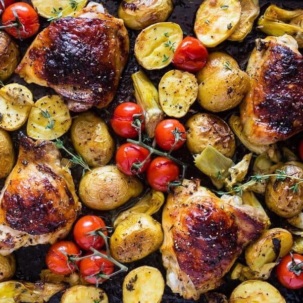This sheet pan French dressing chicken thigh dinner is the perfect combination of Zesty French dressing tossed with baby potatoes, artichoke hearts and vine-ripened tomatoes. You’ll love how easy it to throw together and how delicious it tastes!