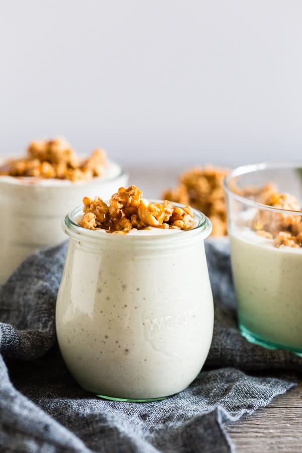 Caramel Apple Crisp Milkshake poured into 2 different glasses. 