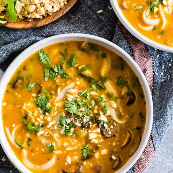 This vegan red curry pumpkin noodle soup is the perfect way to celebrate fall. Creamy pumpkin mixed with vegetable broth, coconut milk, mushrooms and baby bok choy all mixed together with Thai flavors and noodles for slurping.