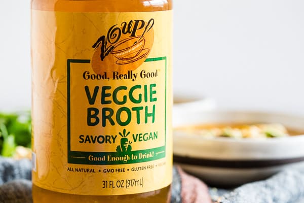 A jar of veggie broth. 