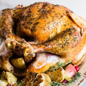 This garlic herb maple roast turkey is packed full of flavor with just a touch of maple syrup sweetness. It’s the perfect addition to any holiday table!
