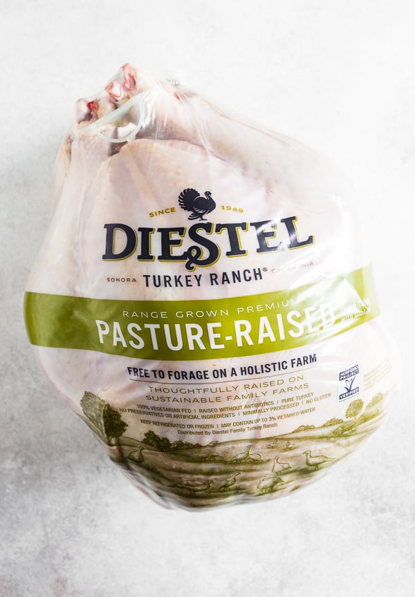 An uncooked turkey in a bag. 