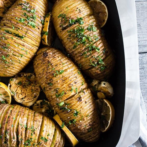 These lemon herb Hasselback potatoes are a great twist to a typical roast potato. Packed full of lemon and garlic flavor they make a fun addition to any dinner table. 
