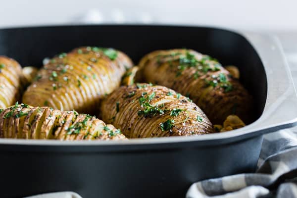 These lemon herb Hasselback potatoes are a great twist to a typical roast potato. Packed full of lemon and garlic flavor they make a fun addition to any dinner table. 