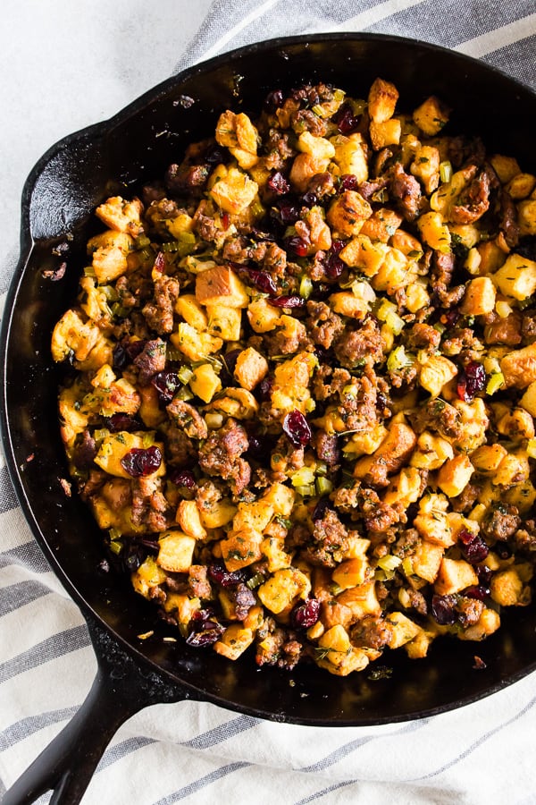Potato bread sausage stuffing in a cast iron skillet.