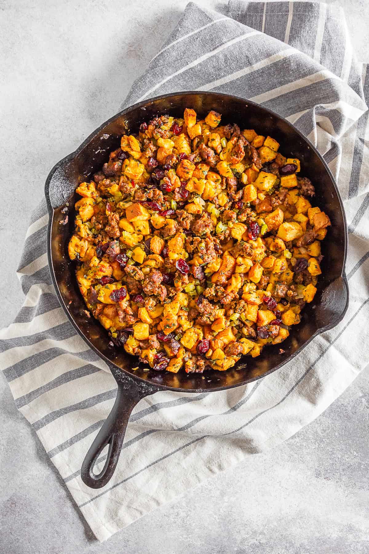 Potato Bread Sausage Cranberry Stuffing served on a table. 