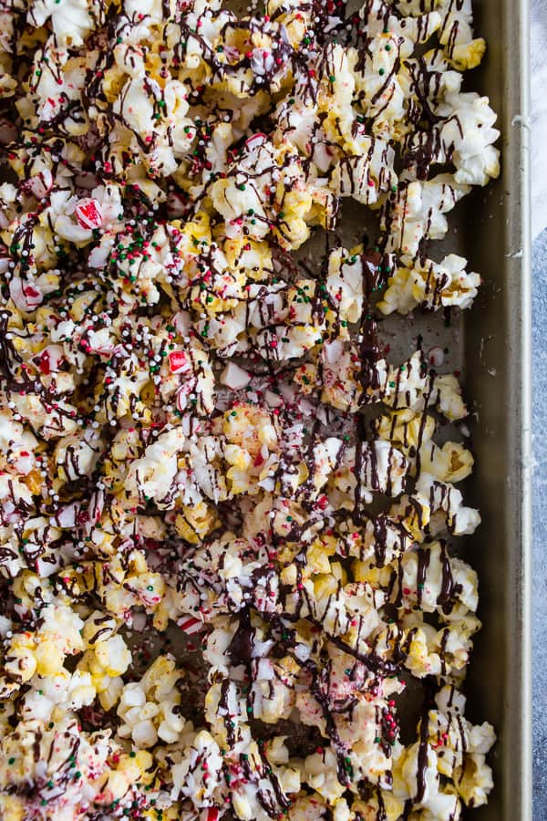 Peppermint Bark Popcorn on a sheet pan.