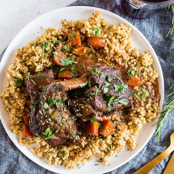 These instant pot red wine rosemary short ribs are the perfect use of your electric pressure cooker. They turn out perfectly tender and are packed full of red wine and rosemary flavor. They are even better when served with ancient grains and drizzled with red wine gravy. 