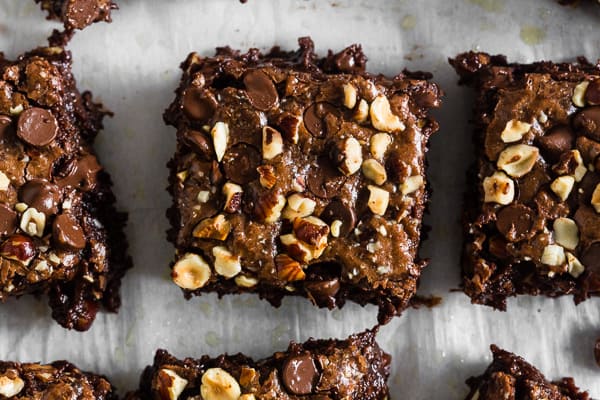 Hazelnut Buckwheat Brownies topped with nuts. 