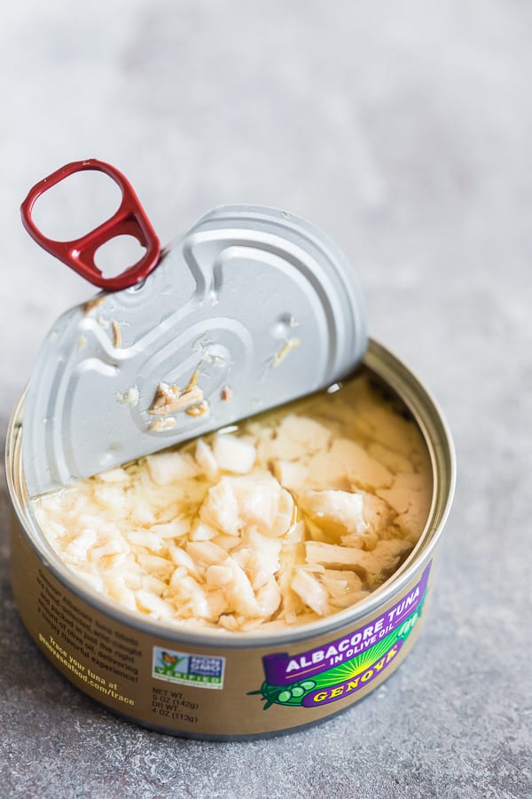 A can of tuna opened to show the contents. 