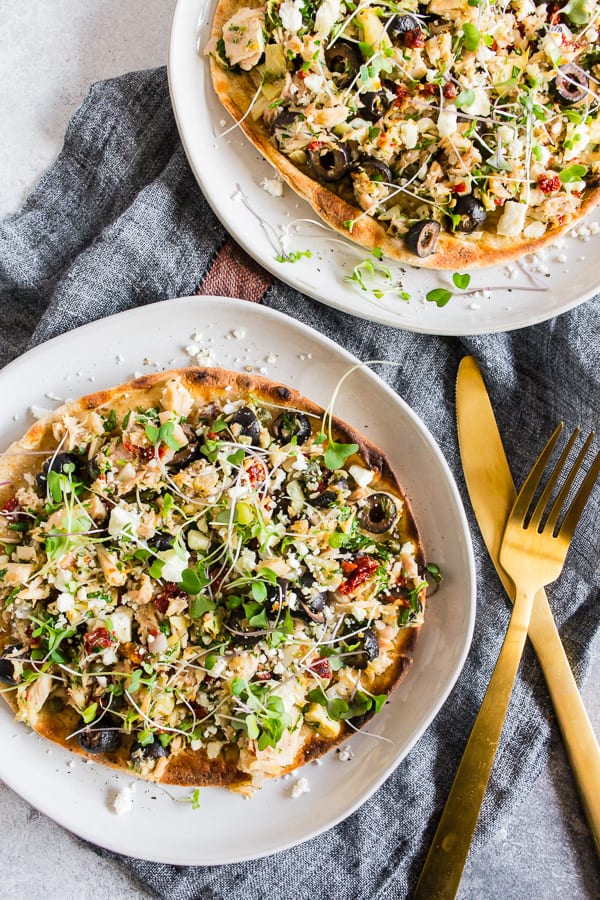 Mediterranean Tuna Salad Flatbread on a white plate. 