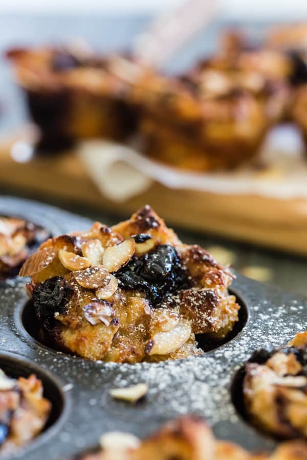 Cherry Yogurt French Toast Cups topped with powdered sugar.