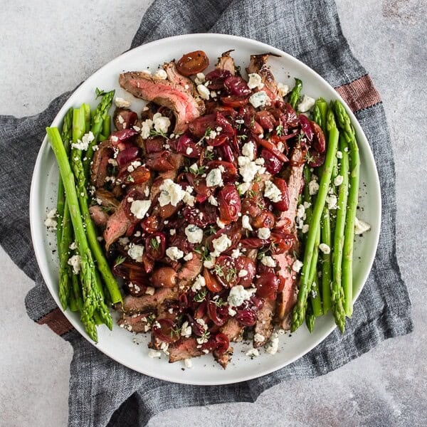 This grape and blue cheese flank steak is the perfect romantic meal and it's ready in JUST 30 minutes! Herb marinated flank steak cooked on the stovetop and topped with balsamic sautéed grapes and shallots and sprinkled with blue cheese - what's not to love? 