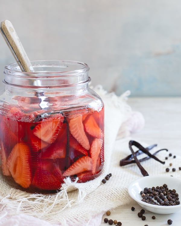 Pickled strawberries in a jar. 
