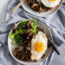 This garlic wild mushrooms on toast is a flavorful way to start your day. Perfectly toasted sourdough bread covered with sauteed mushrooms with garlic and herbs and topped with a fried egg. It's super flavorful and makes a great breakfast, lunch or dinner.