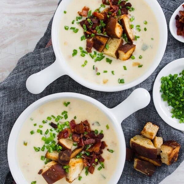 This spicy sharp cheddar beer soup is the perfect cheesy soup you need for cold spring nights. It’s slightly spicy with the addition of fresh jalapeno and pepper jack cheese with just the right splash of beer flavor and sharp cheddar. Perfect when topped with homemade soft pretzel croutons, fresh chives, and crispy bacon.