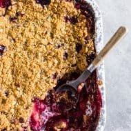 This cardamom vanilla plum crisp is filled with juicy plums and topped with a crunchy oatmeal hazelnut topping. It's the perfect sweet treat to end the day with a perfect hint of vanilla bean and cardamom flavor. 
