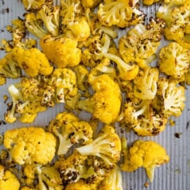 This super simple roasted orange cauliflower is the perfect side dish vegetable. Plus the deep orange color is not only pretty but it provides more Vitamin A than typical cauliflower. It's healthy, delicious and can be used in place of any traditional cauliflower recipe.