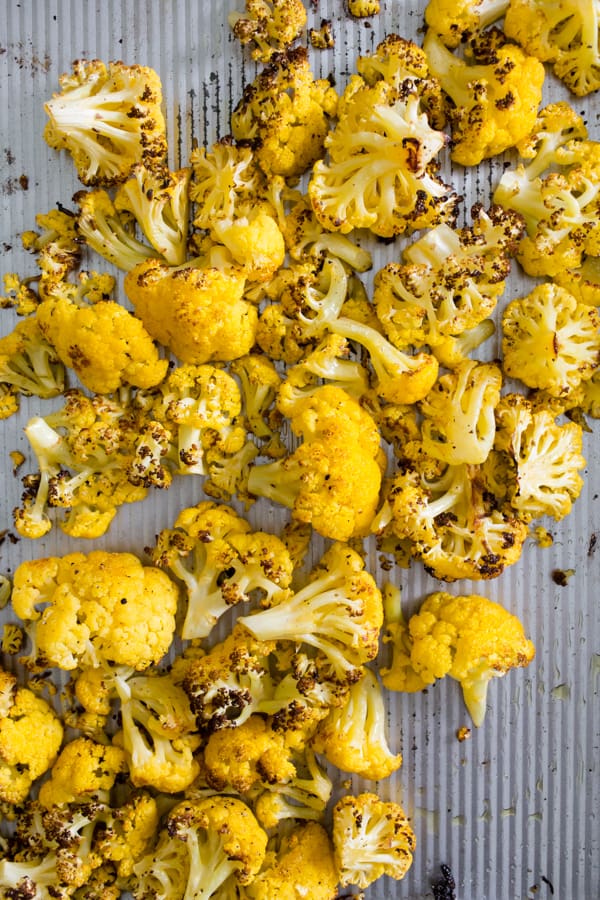 Roasted Orange Cauliflower on a sheet pan.