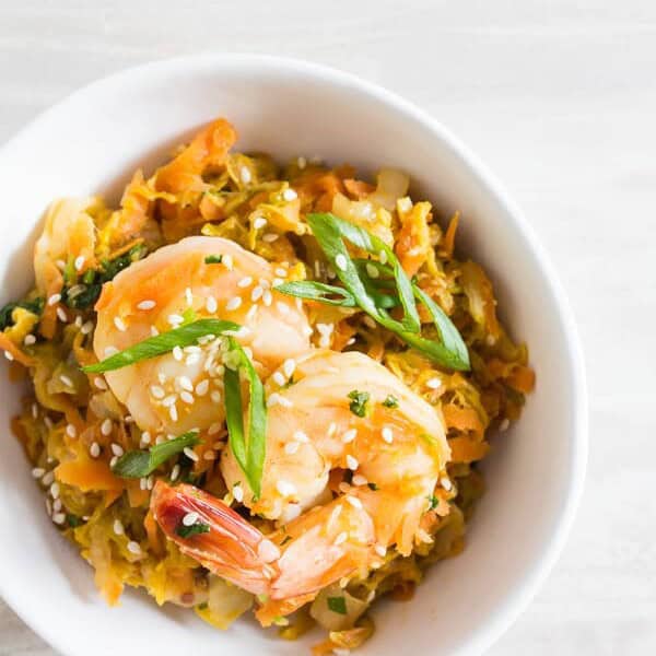 This spicy shrimp egg roll skillet is the quick and easy weeknight meal you need! It's packed full of napa cabbage, carrots, garlic, ginger, and spicy shrimp. It's ready in just 30 minutes and packed full of flavor! 