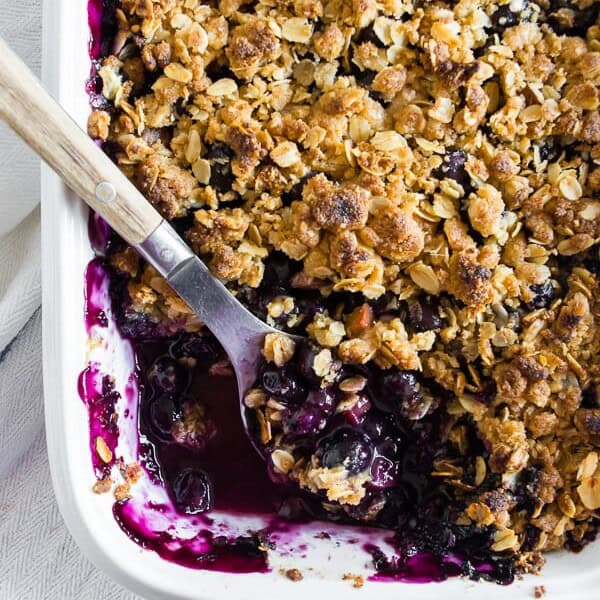 This blueberry rhubarb crisp is the perfect way to celebrate the bounty of summer. Sweet blueberries paired with tart rhubarb and topped with a crunchy rolled oat topping. It's delicious eaten warm and even better when topped with ice cream or whipped cream. 