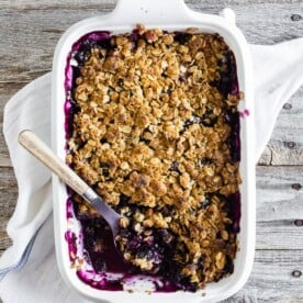 This blueberry rhubarb crisp is the perfect way to celebrate the bounty of summer. Sweet blueberries paired with tart rhubarb and topped with a crunchy rolled oat topping. It's delicious eaten warm and even better when topped with ice cream or whipped cream. 