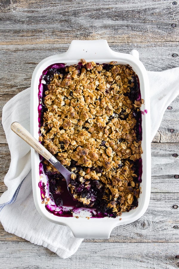 This blueberry rhubarb crisp is the perfect way to celebrate the bounty of summer. Sweet blueberries paired with tart rhubarb and topped with a crunchy rolled oat topping. It's delicious eaten warm and even better when topped with ice cream or whipped cream. 