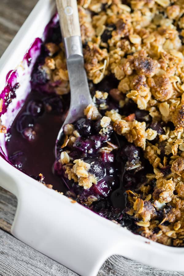 This blueberry rhubarb crisp is the perfect way to celebrate the bounty of summer. Sweet blueberries paired with tart rhubarb and topped with a crunchy rolled oat topping. It's delicious eaten warm and even better when topped with ice cream or whipped cream. 