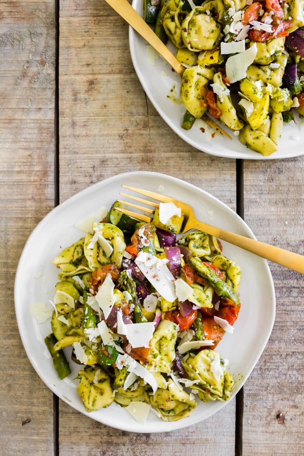 Roasted Vegetable Tortellini Salad on a plate with a fork. 