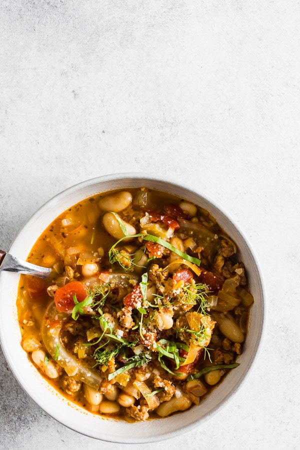 Italian Sausage Fennel White Bean Soup in a white bowl.