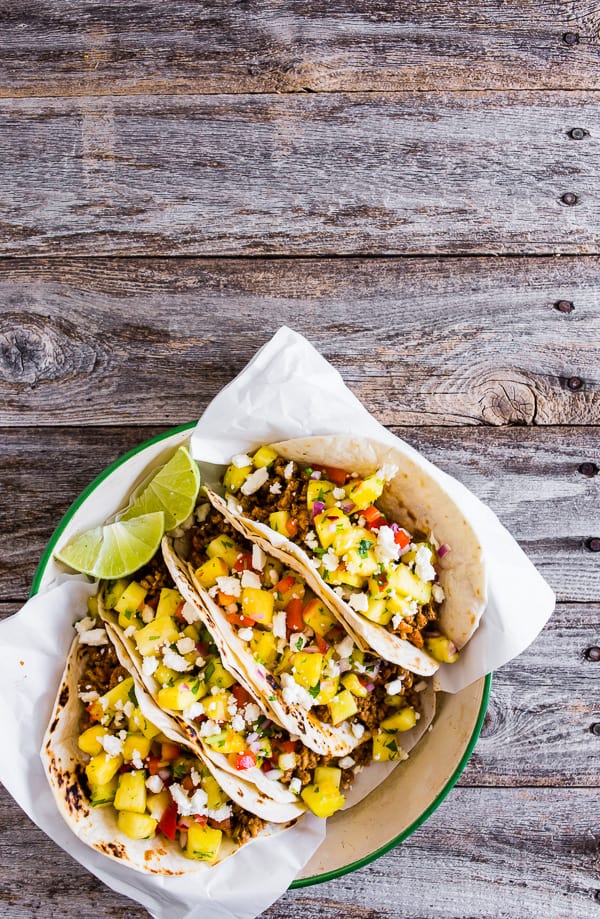 These ground pork tacos with pineapple salsa are the perfect mix of spicy and sweet. They're perfect for a quick weeknight dinner or an easy weekend meal. You'll love all the flavor packed into these tacos!