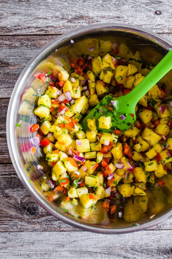 These ground pork tacos with pineapple salsa are the perfect mix of spicy and sweet. They're perfect for a quick weeknight dinner or an easy weekend meal. You'll love all the flavor packed into these tacos!