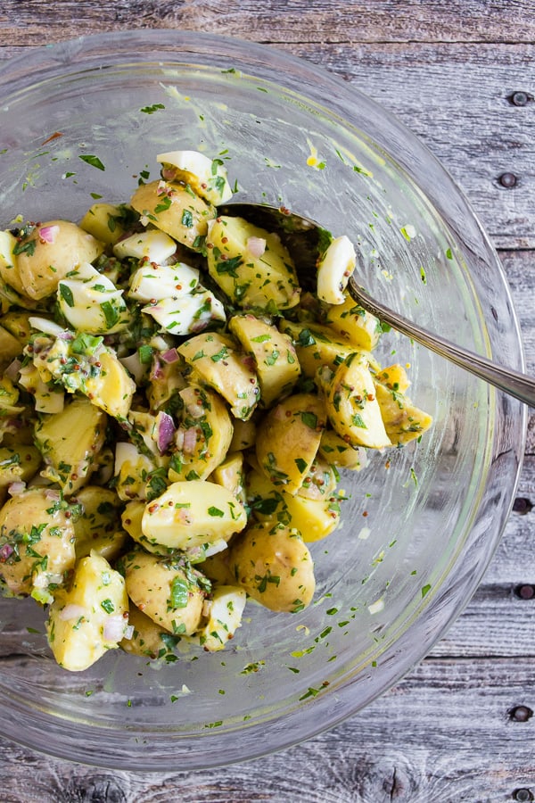 Honey Mustard Potato Salad with a bowl with a spoon. 